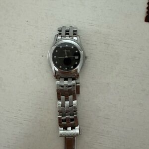 SOLD Unisex Gucci watch silver black face 28mm